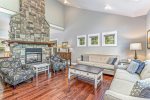 Your group will enjoy spending time around the large stone fireplace in the living room